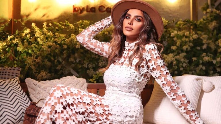 woman in brown hat and white dress