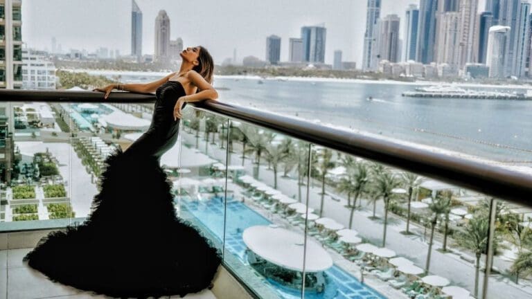 woman wearing black gown on balcony