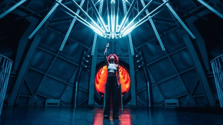 woman standing underneath bright light